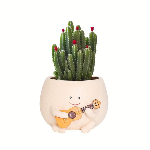 DEKORK GUITAR PLAYING FIGURINE